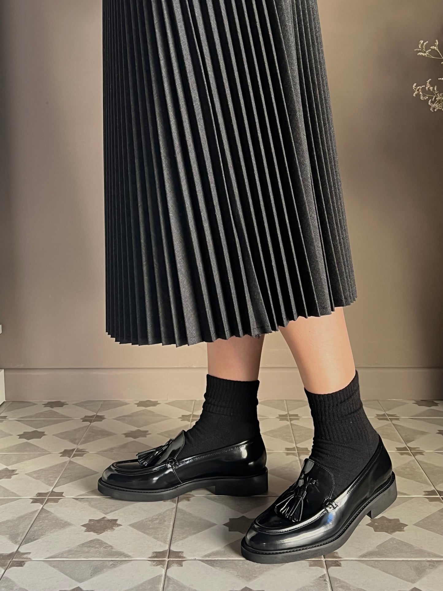 Mocassino in pelle con nappine