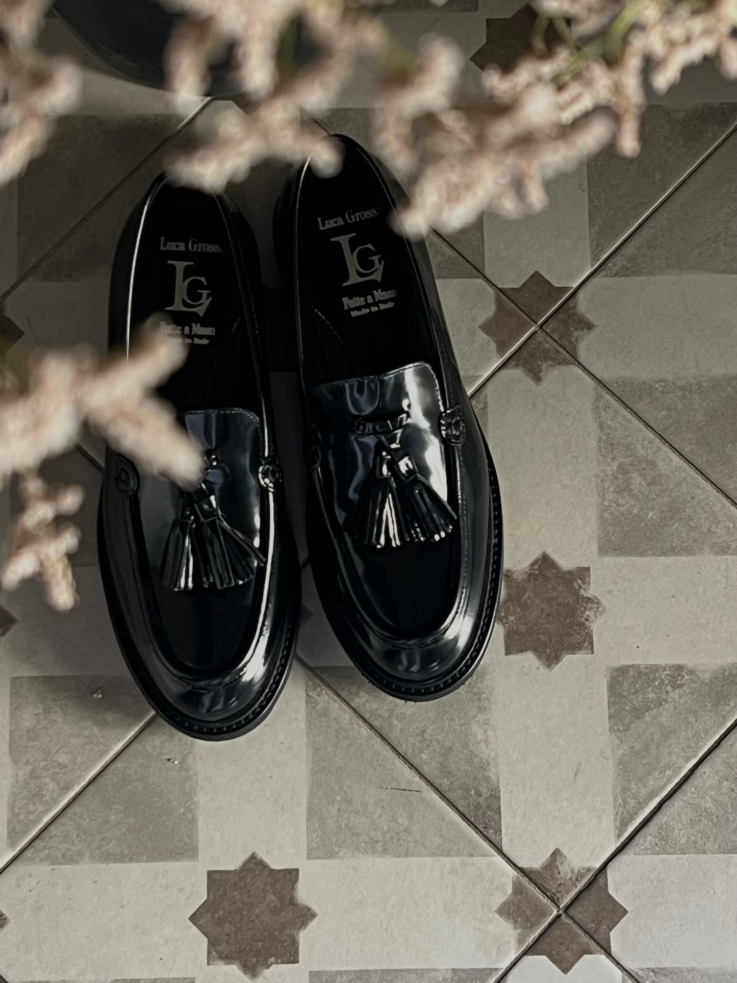 Mocassino in pelle con nappine