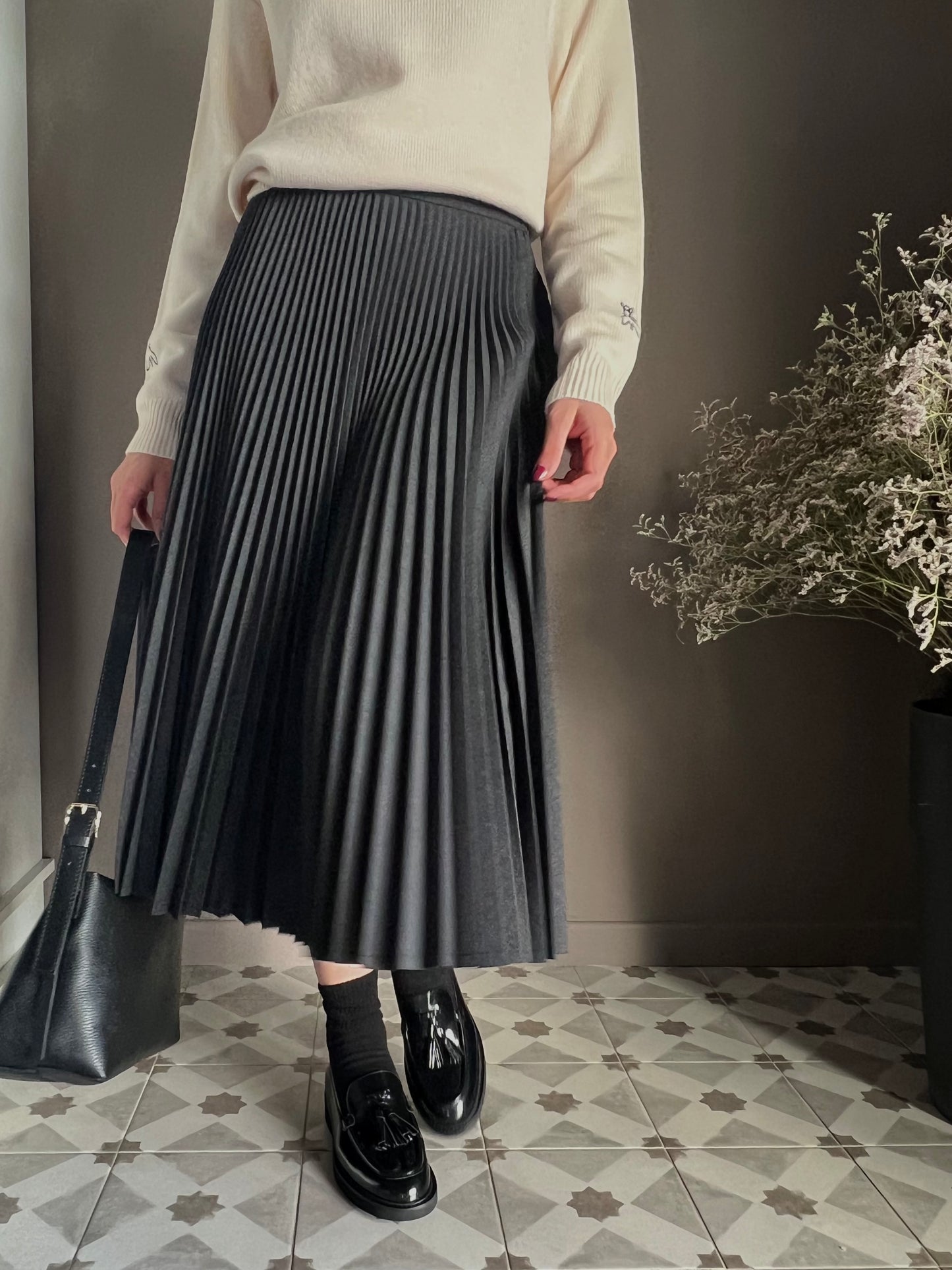 Mocassino in pelle con nappine