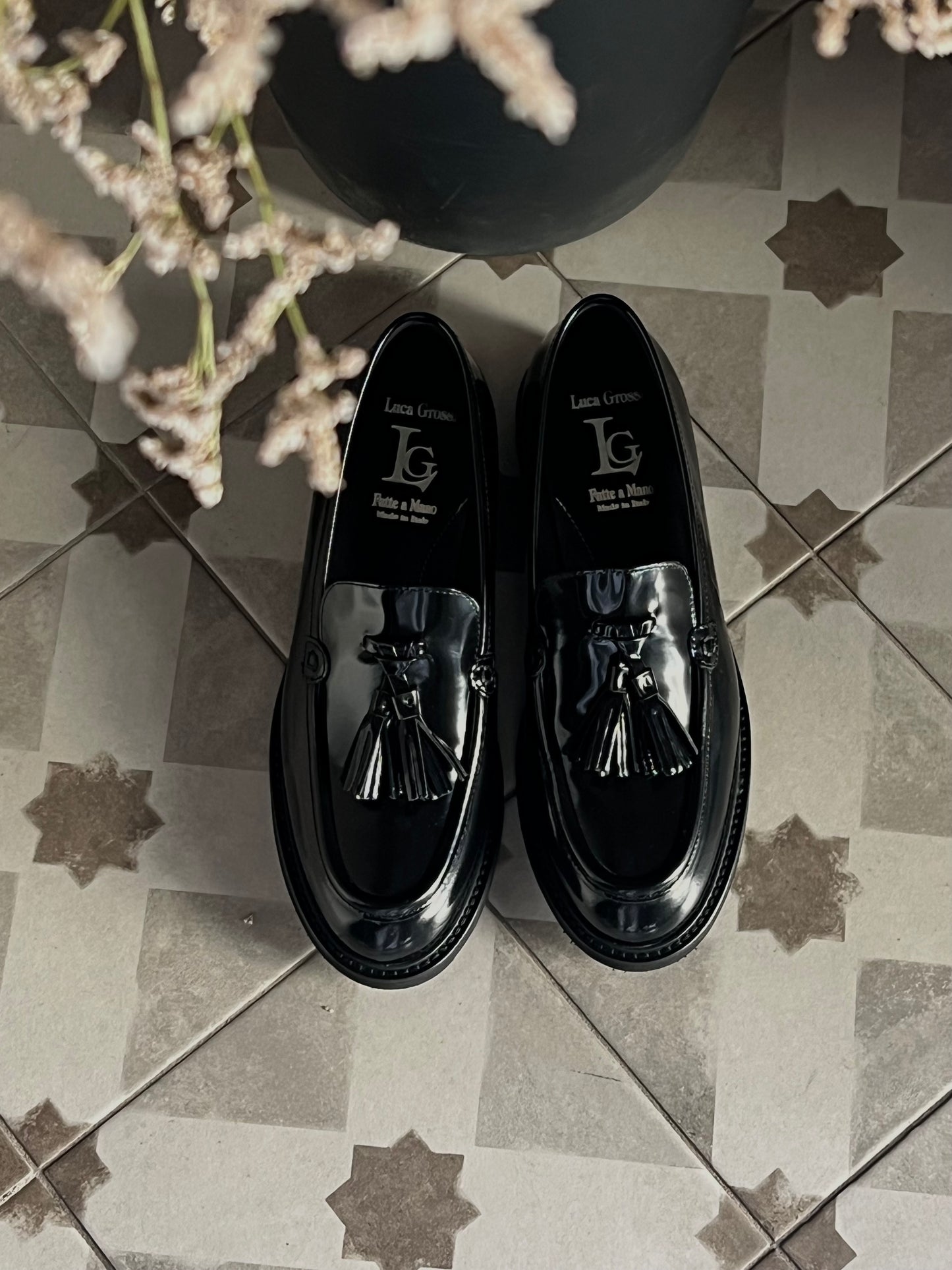 Mocassino in pelle con nappine