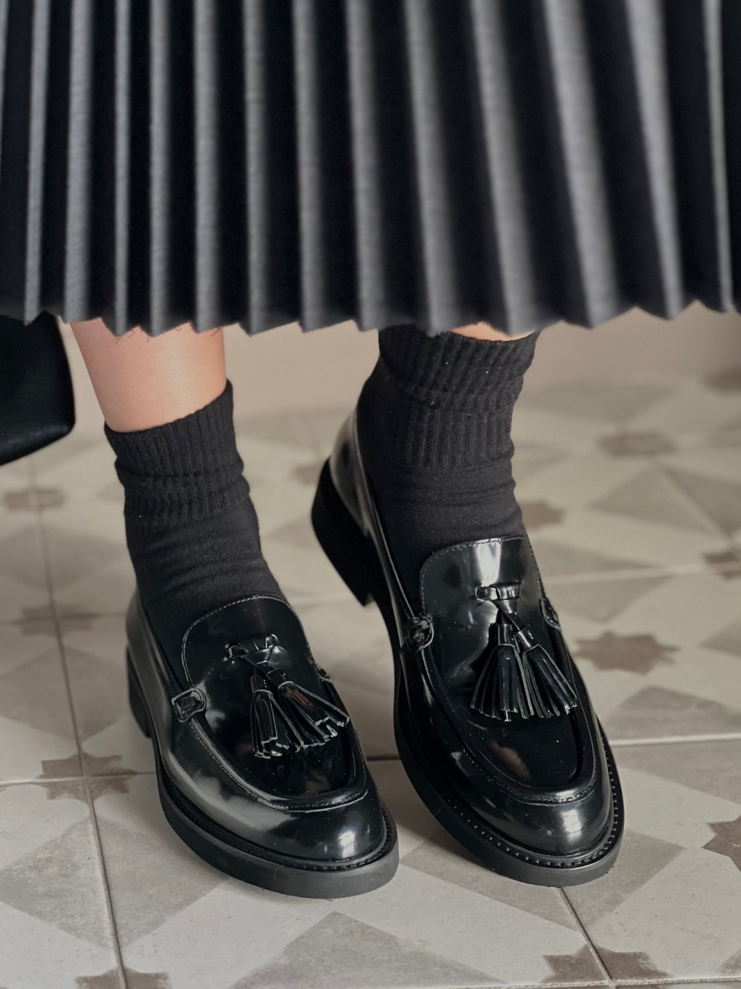 Mocassino in pelle con nappine