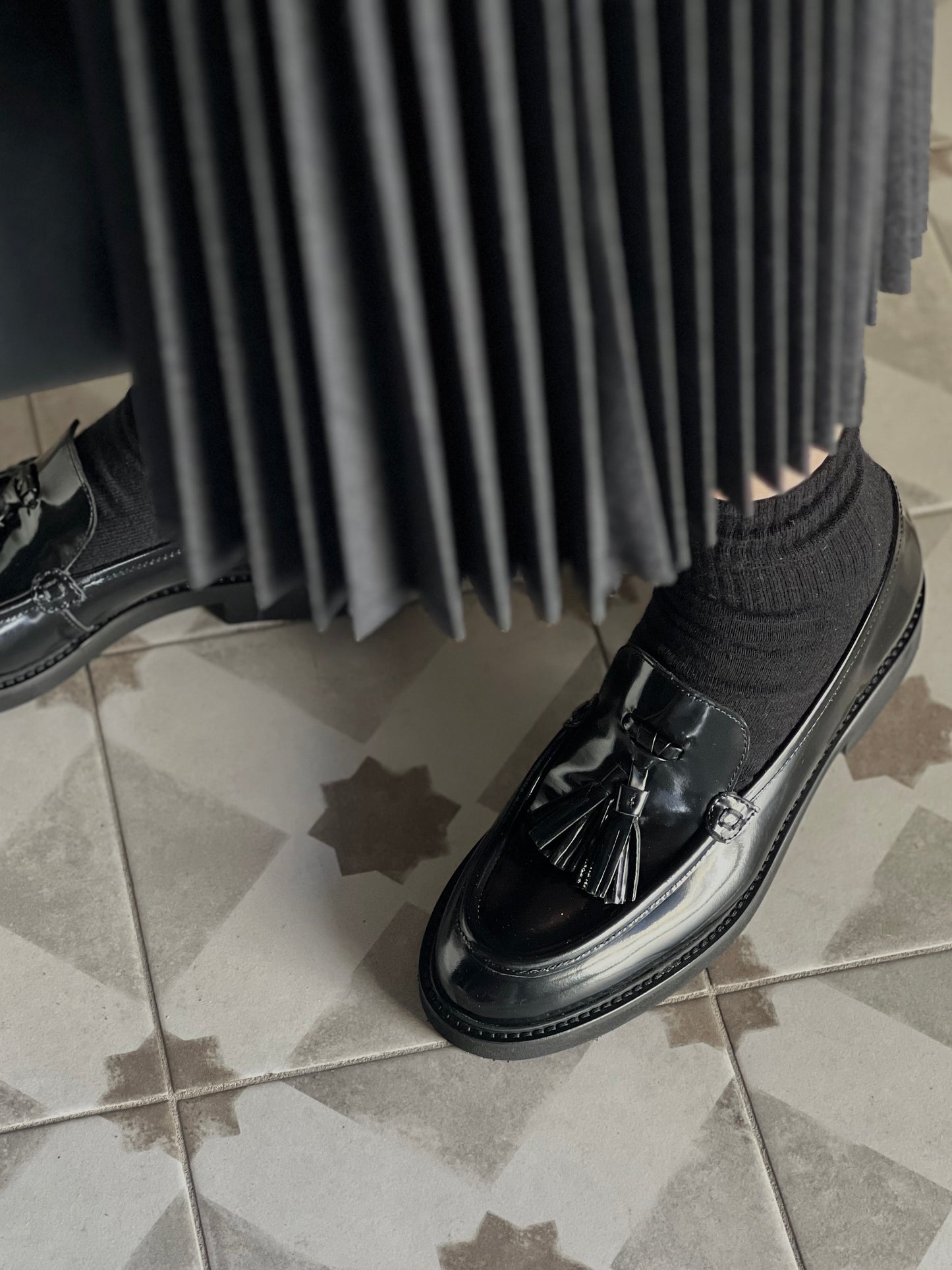 Mocassino in pelle con nappine