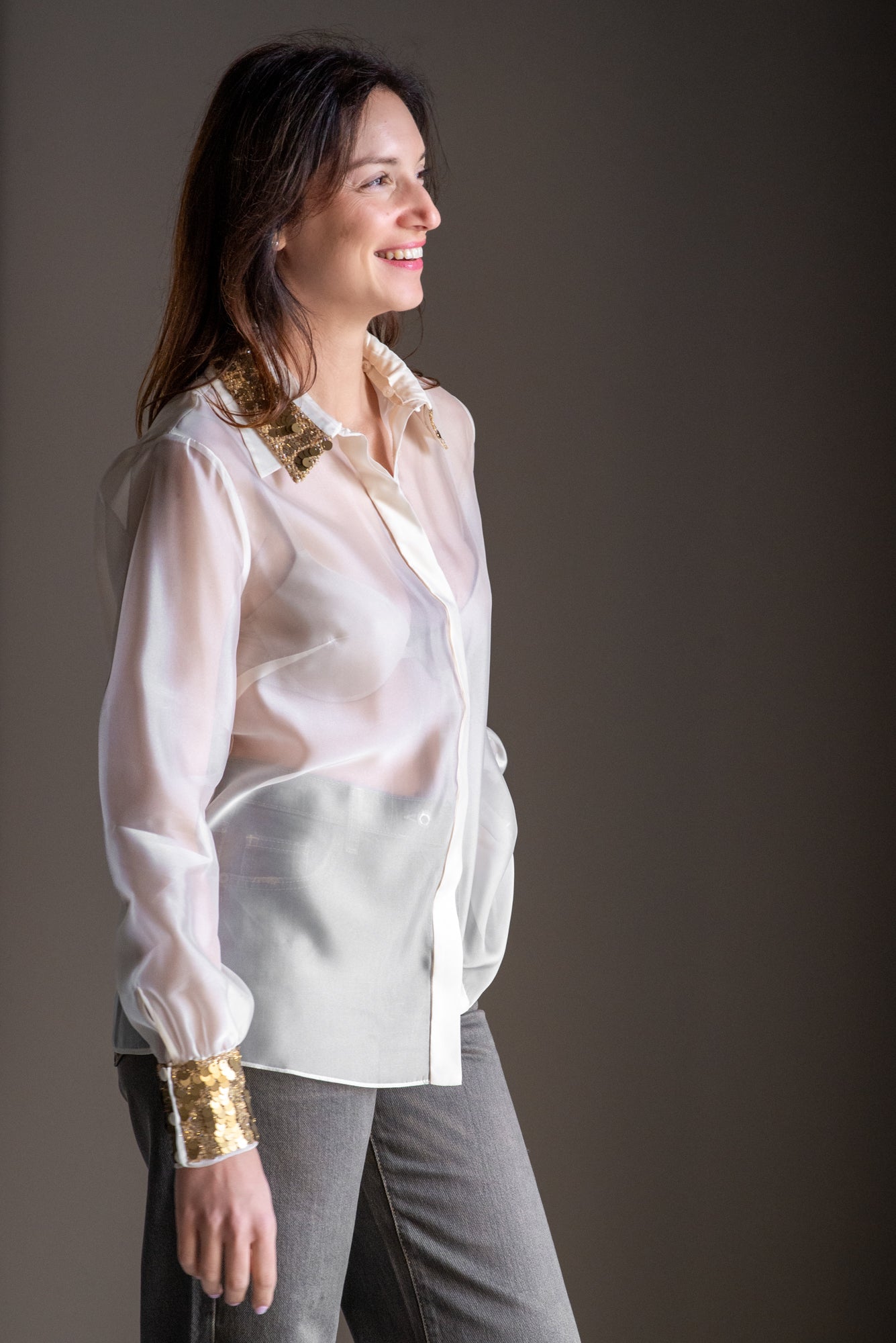 Blusa in organza con dettagli paillettes