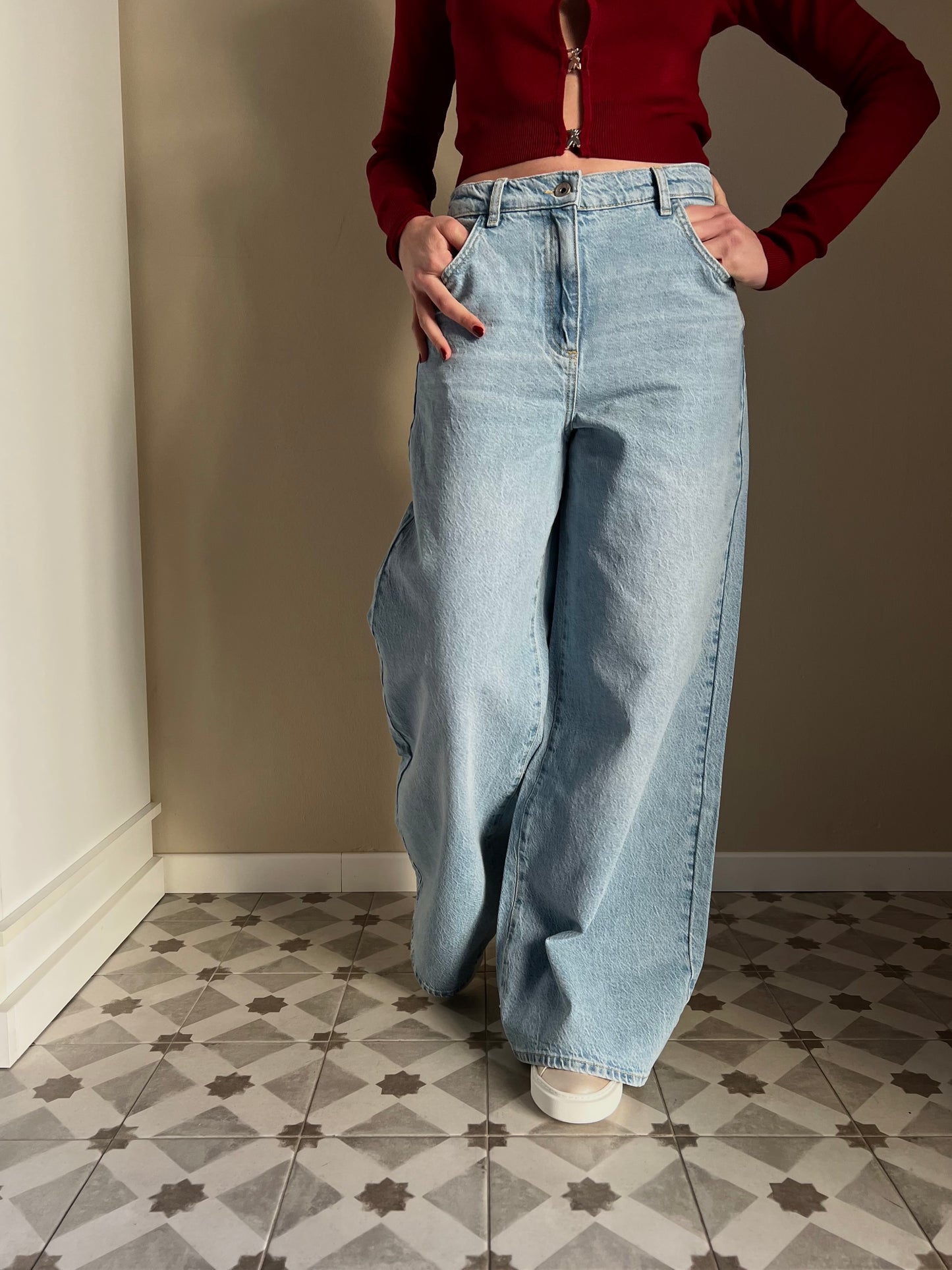 Pantalone jeans vita bassa gamba larga