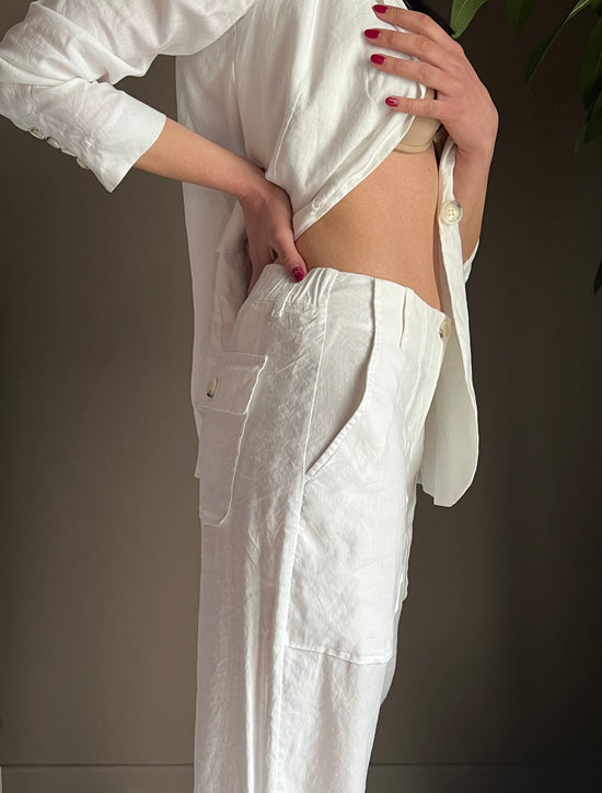 Pantalone in lino bianco con tasche profonde