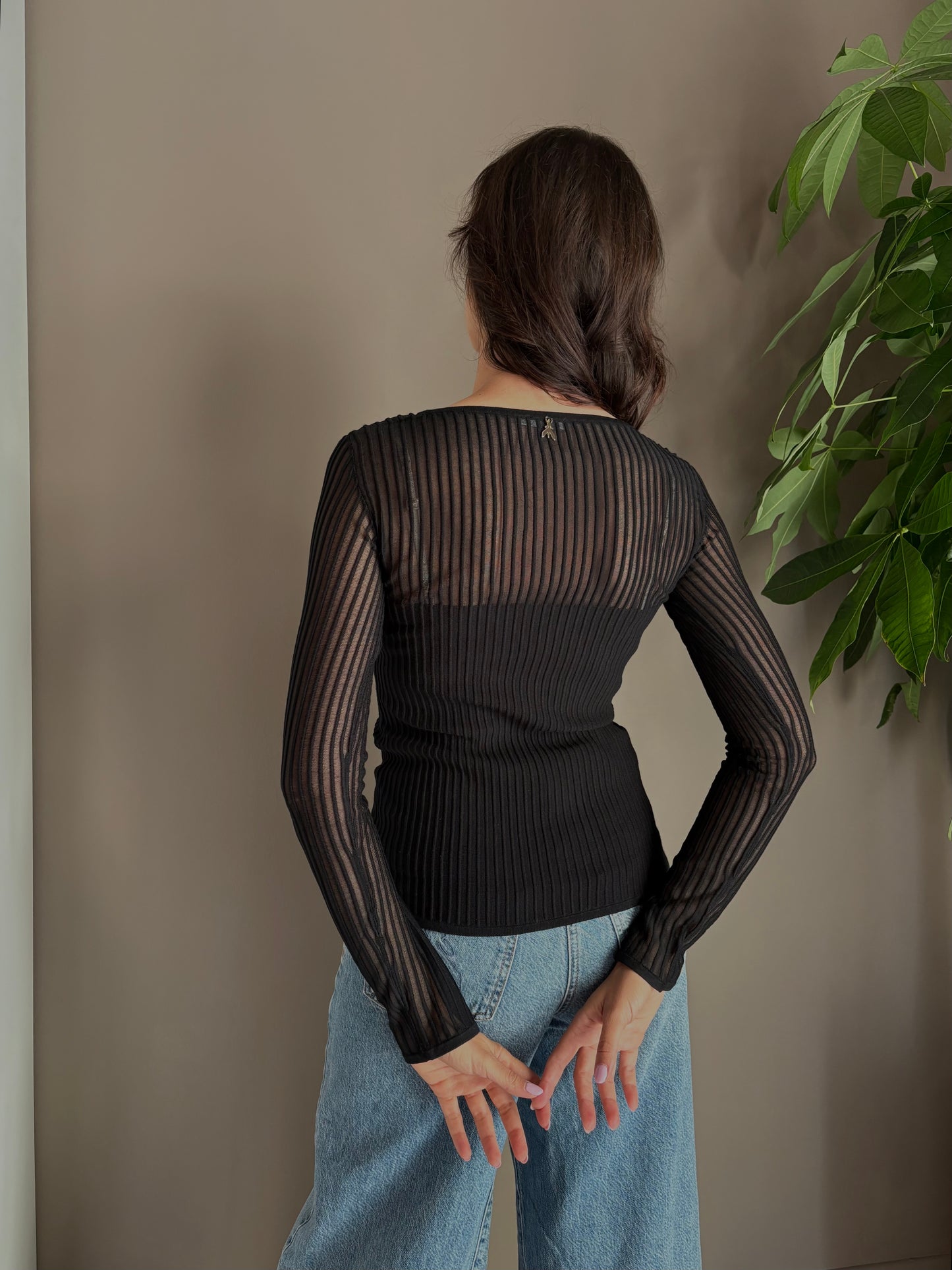 Maglia a costine trasparente