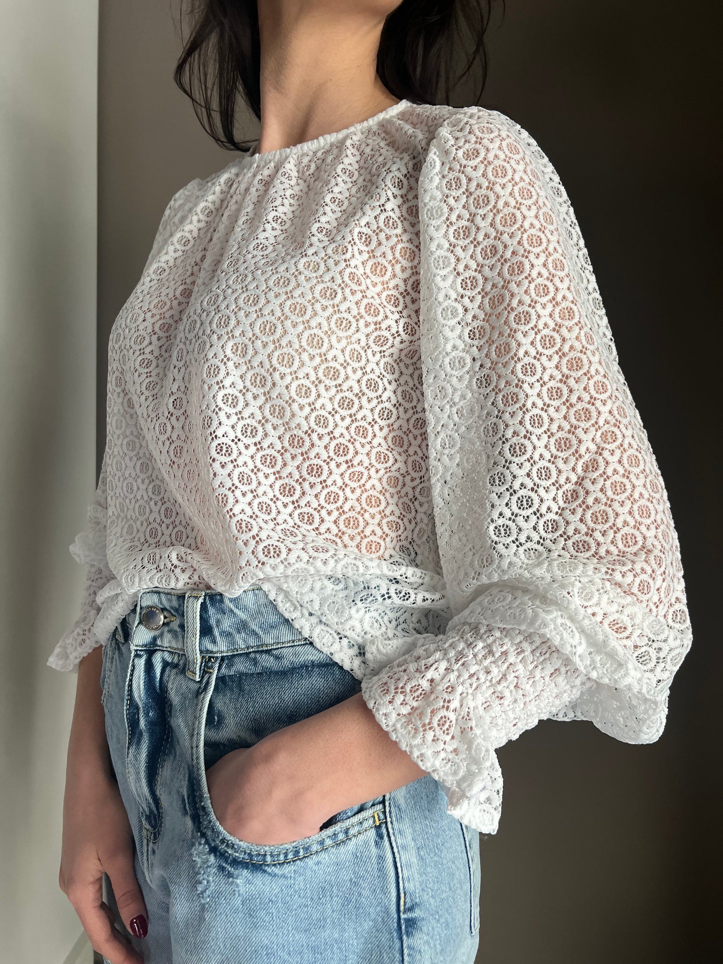 Blusa in pizzo girocollo