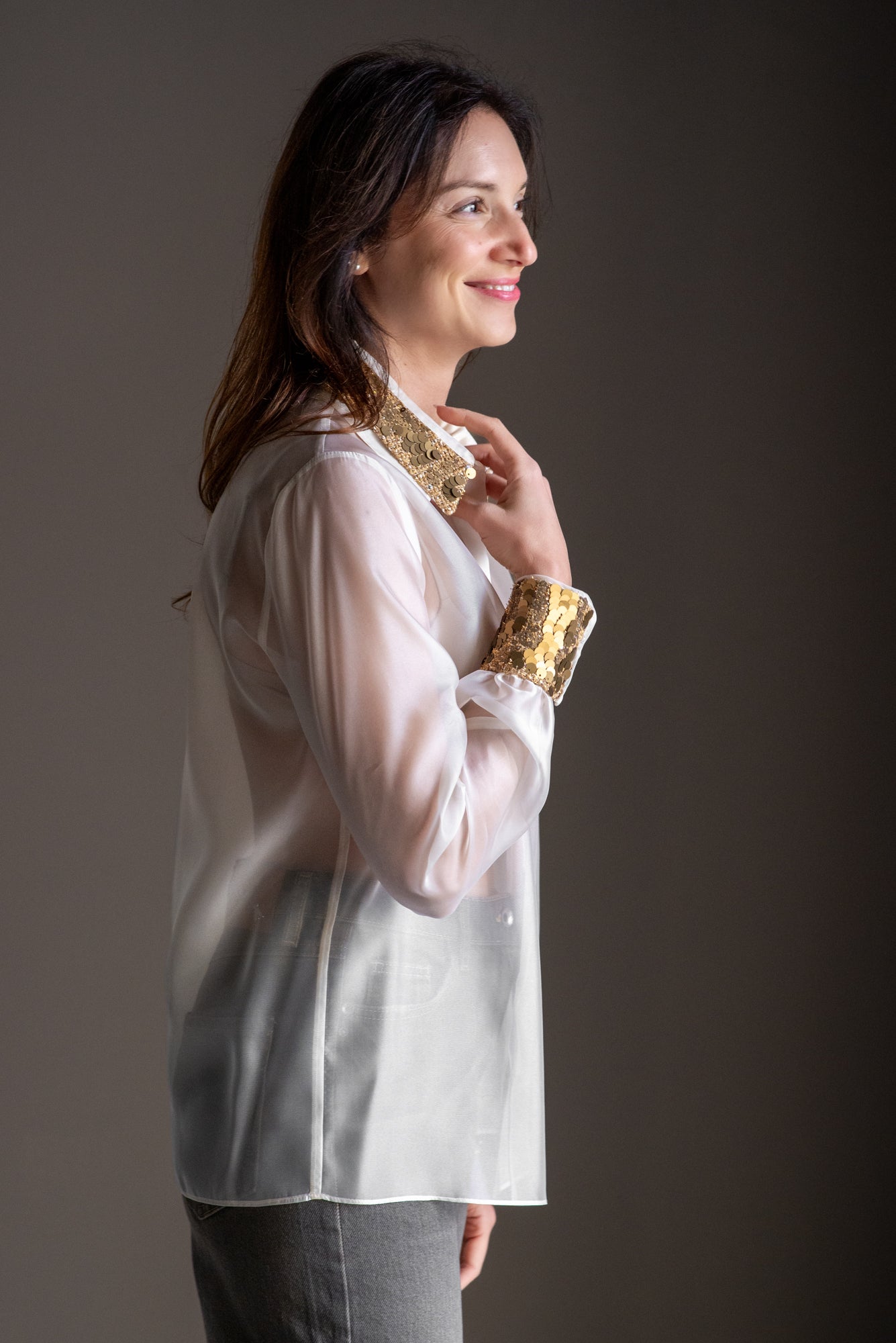 Blusa in organza con dettagli paillettes