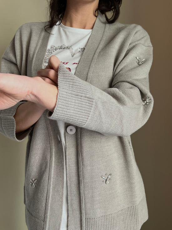 Cardigan con cabochon in strass