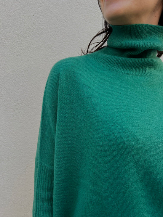 Maglia In Cashemire collo alto maniche aderenti