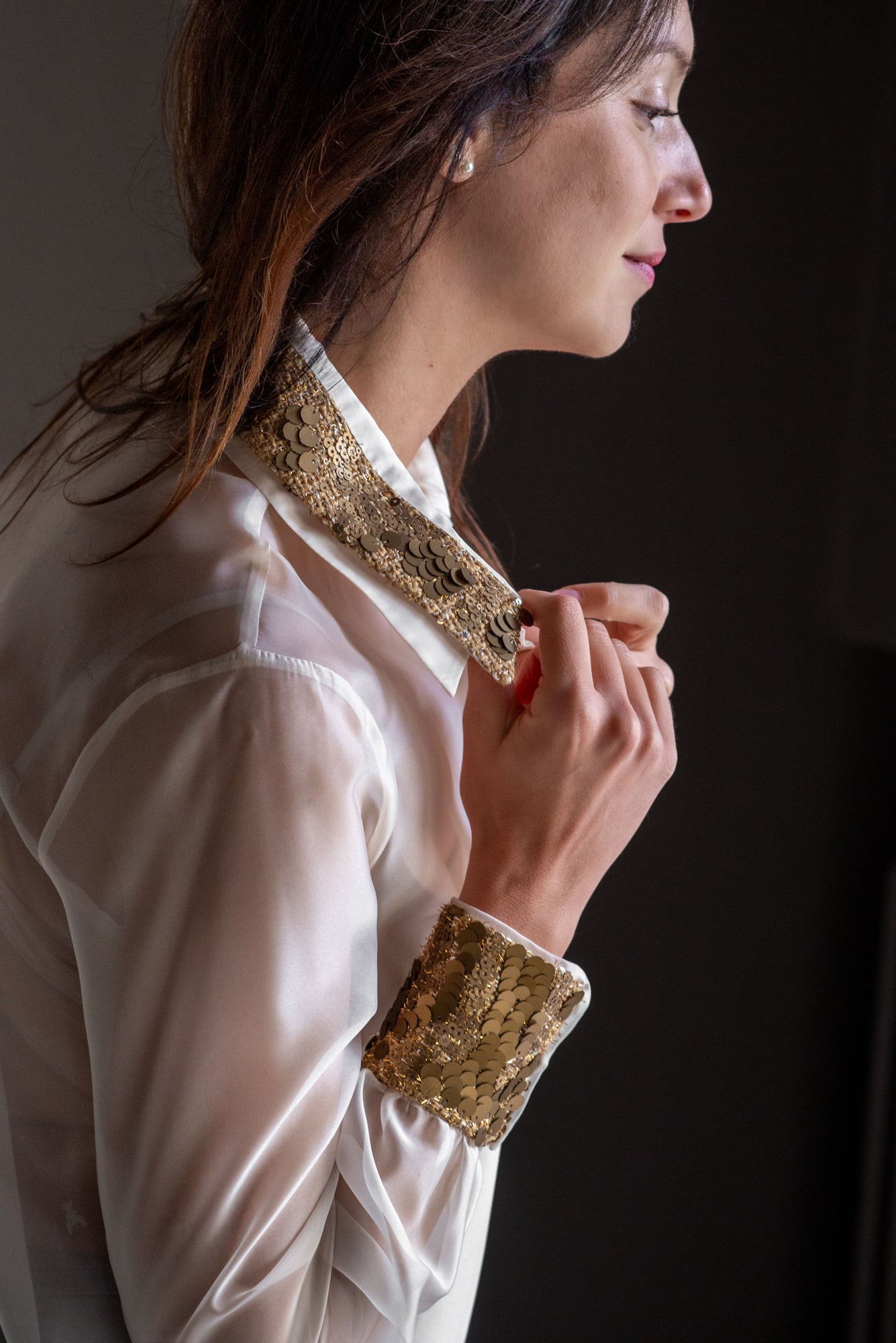 Blusa in organza con dettagli paillettes