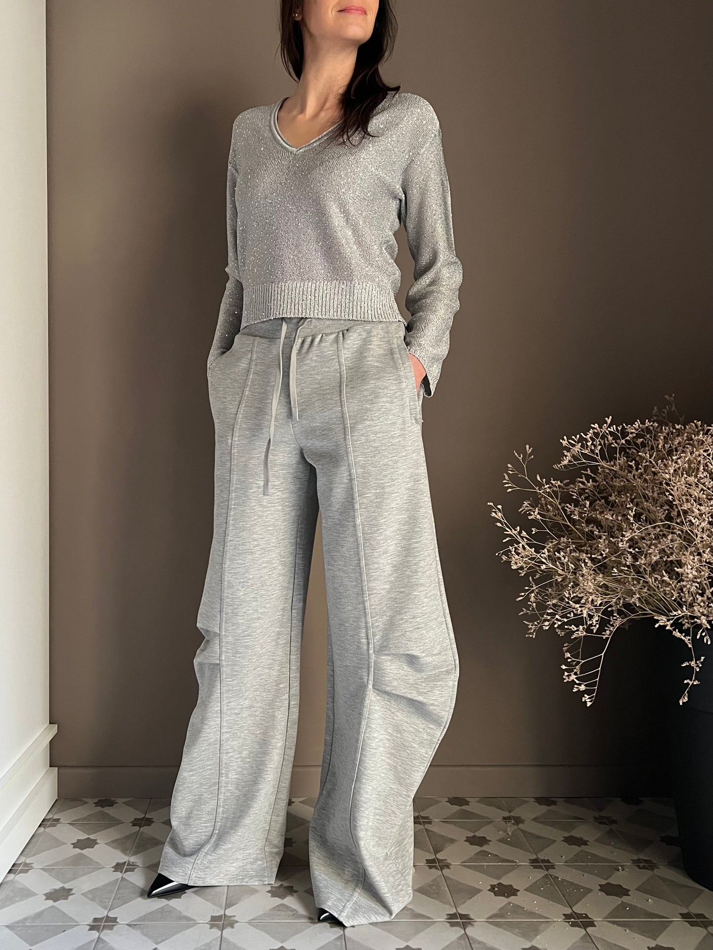 Maglia con scollo a V in paillettes