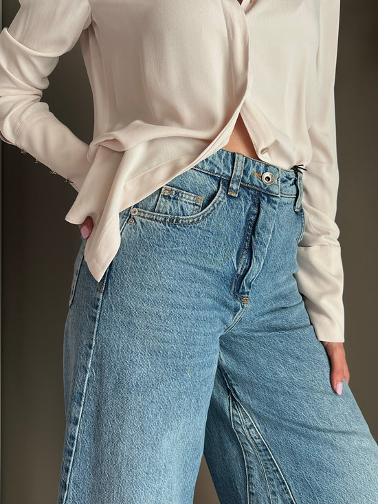Pantalone denim vita alta gamba larga
