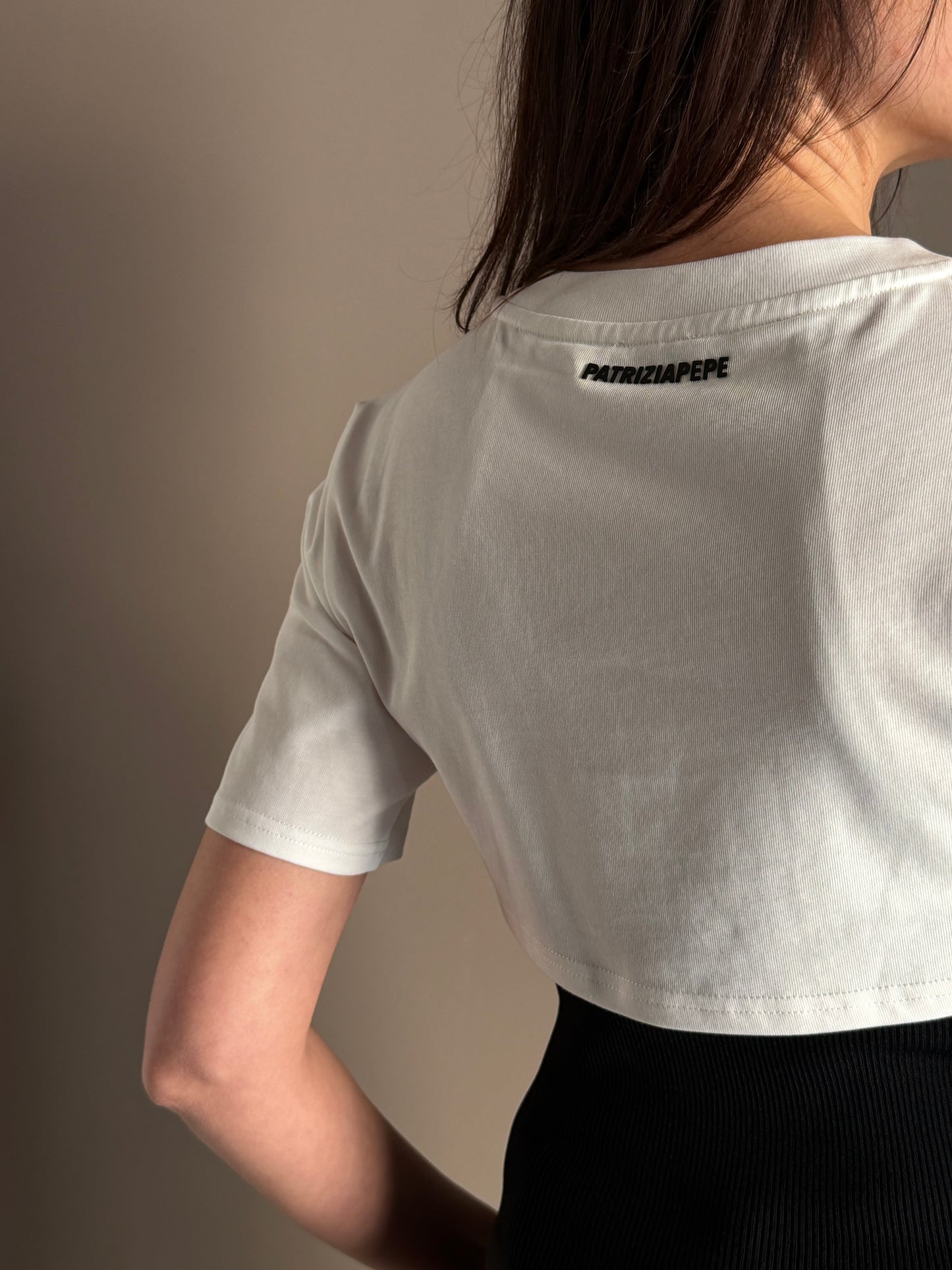 T-shirt con effetto bustino