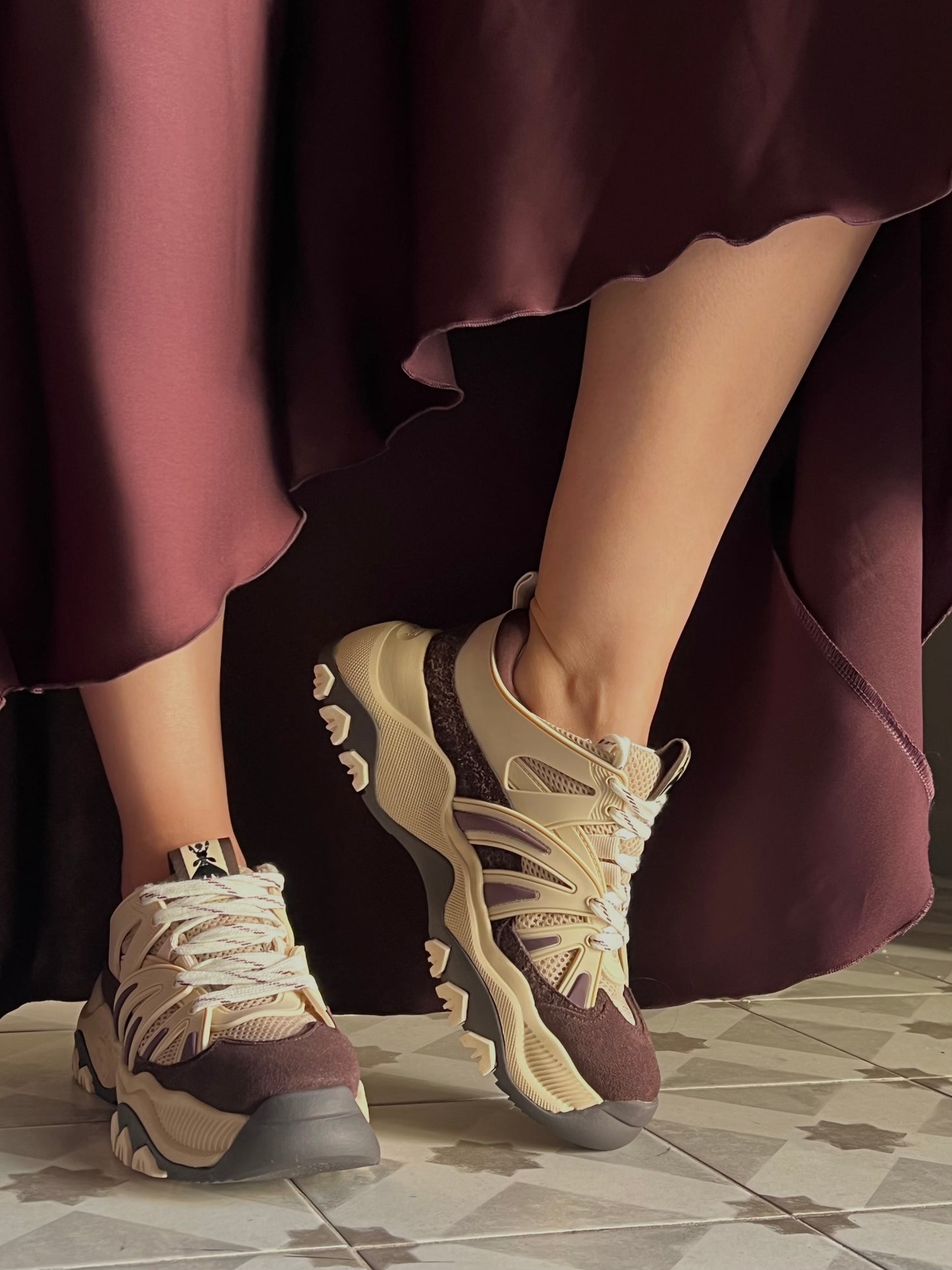 Sneakers running in pelle