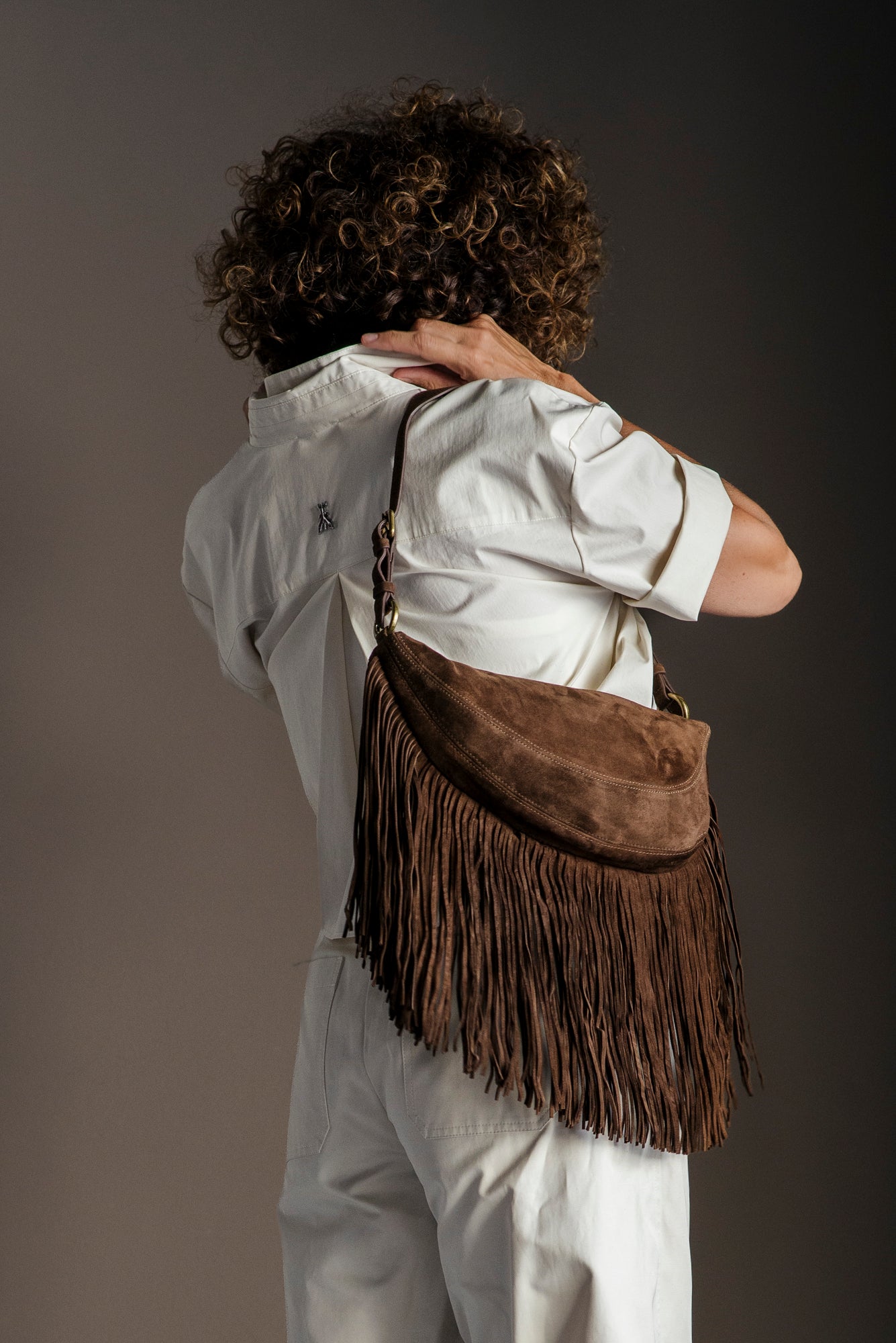 Borsa in suede con frange