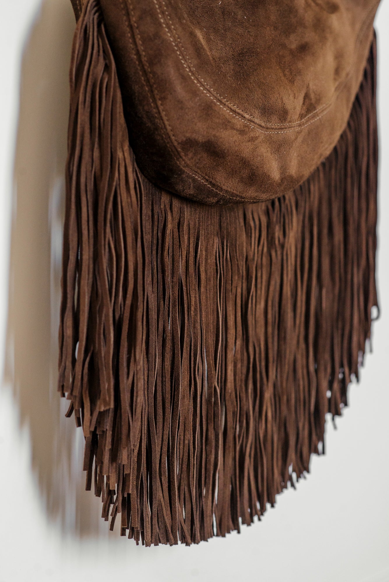 Borsa in suede con frange