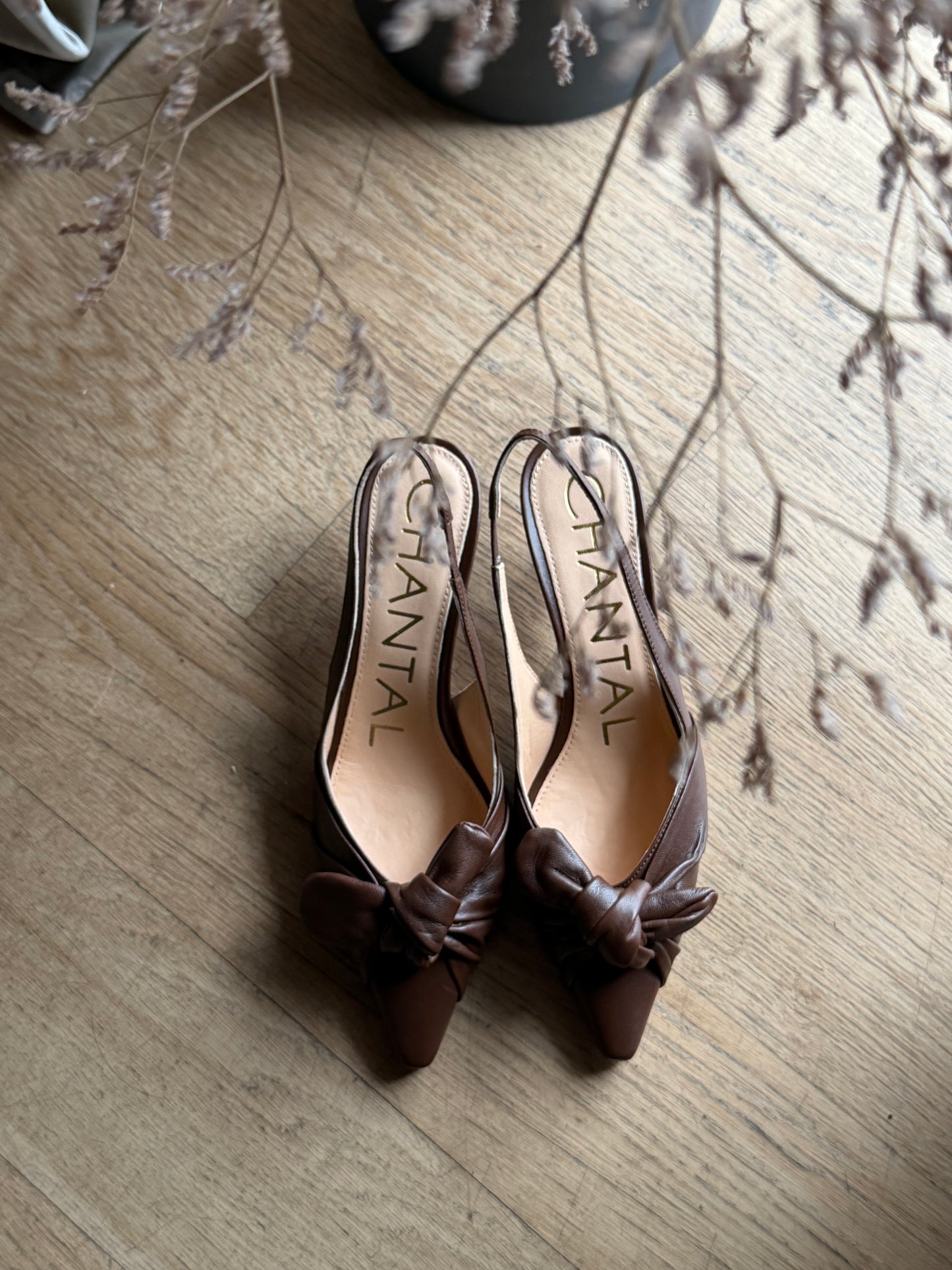 Decolletè in nappa con nodo