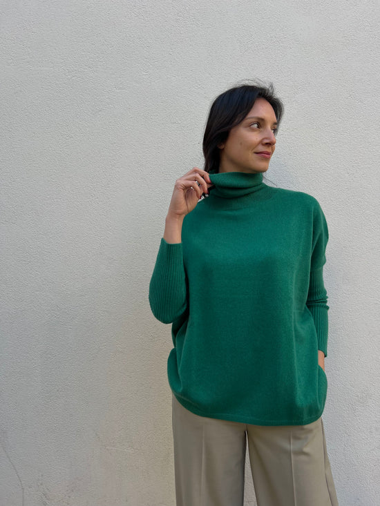 Maglia In Cashemire collo alto maniche aderenti