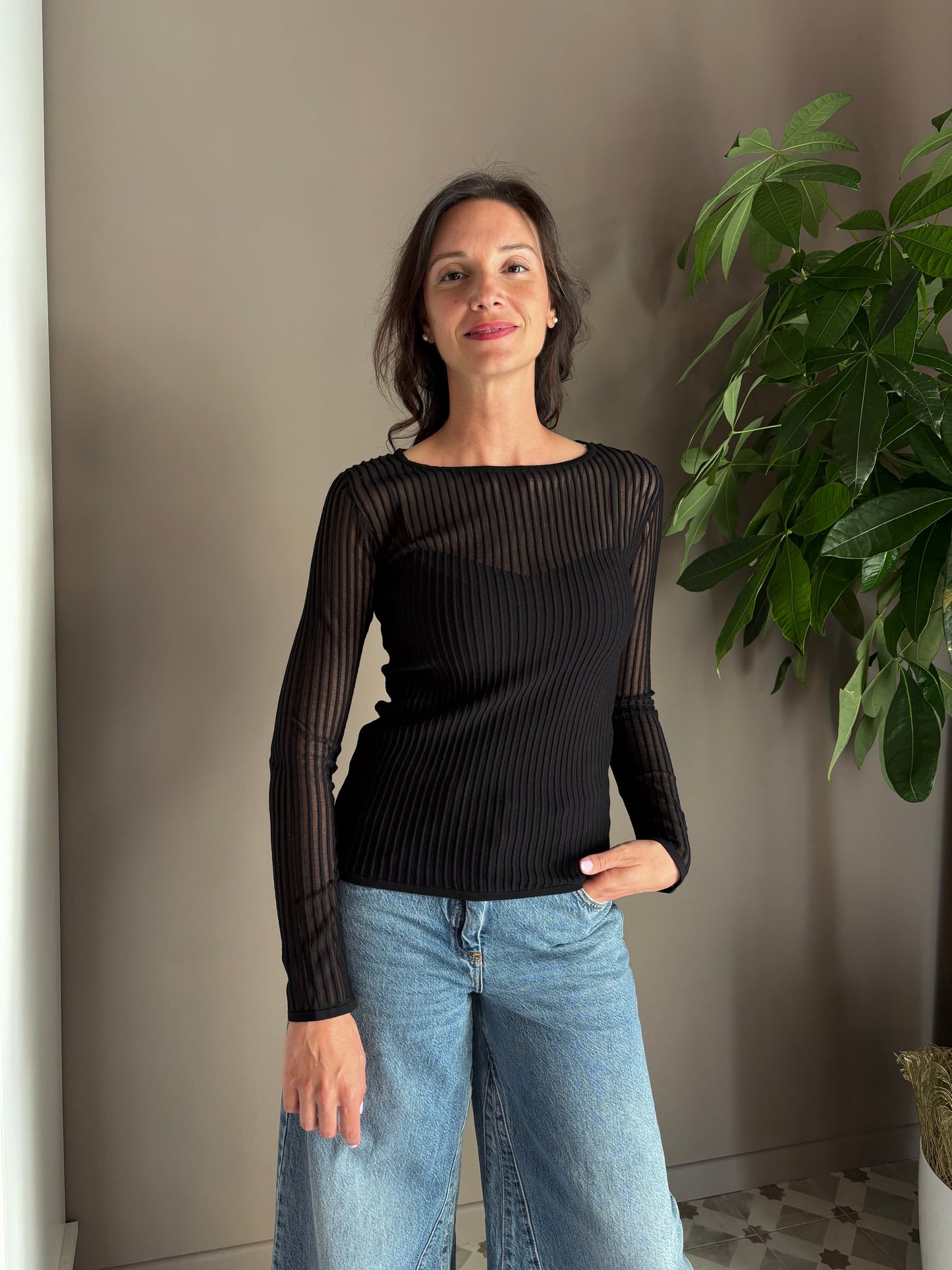 Maglia a costine trasparente