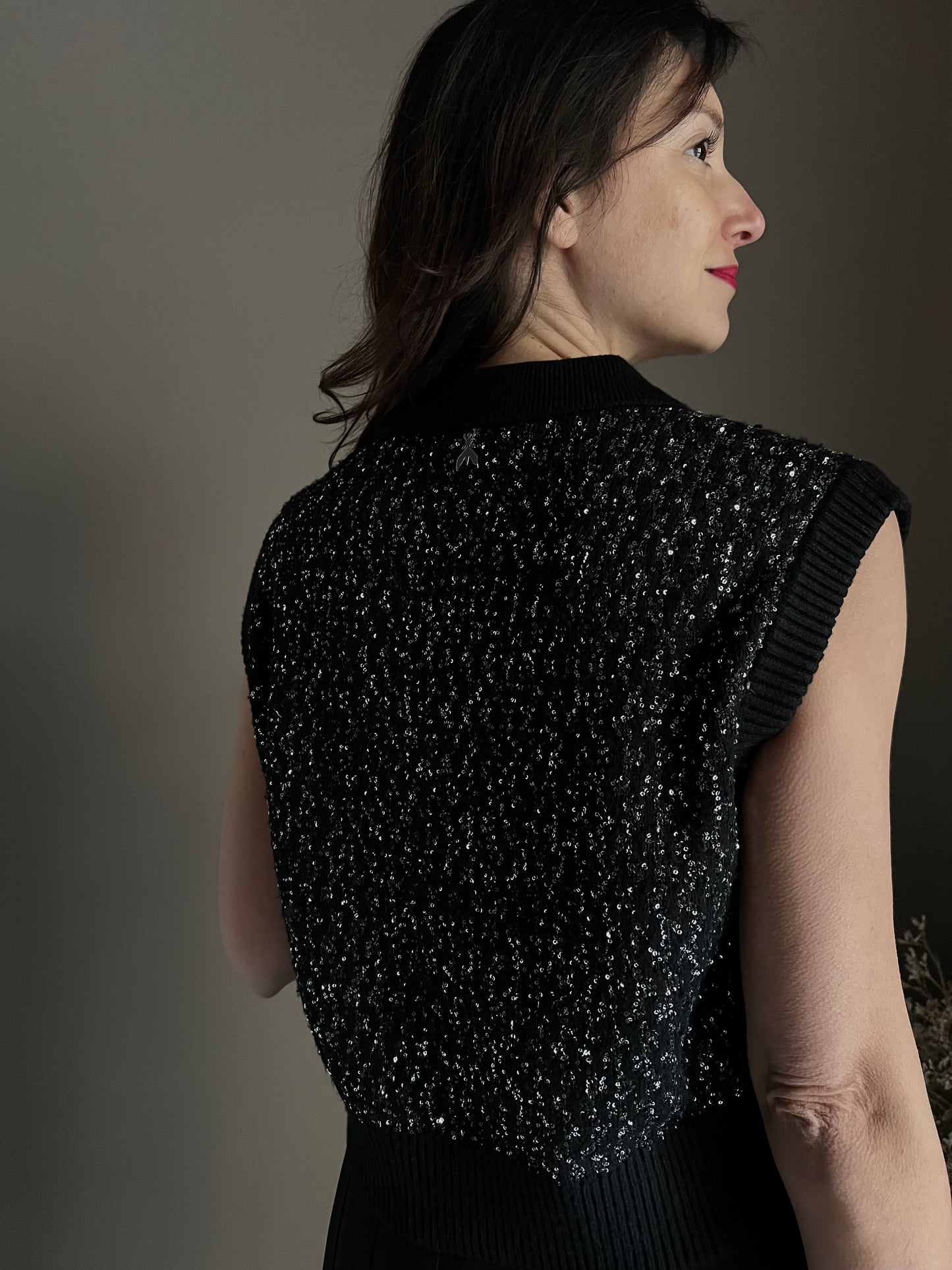 Gilet in maglia con paillettes