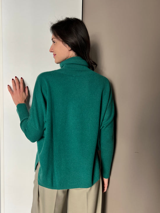 Maglia In Cashemire collo alto maniche aderenti