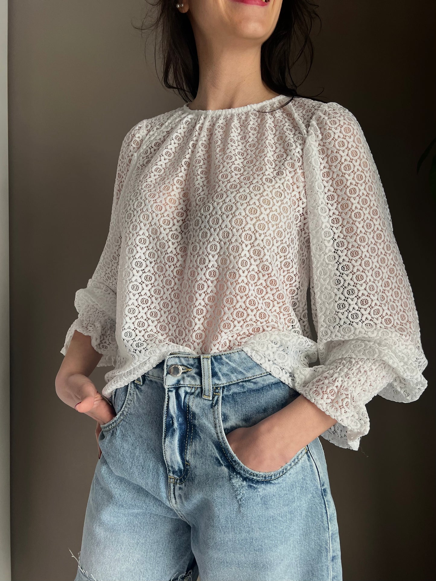 Blusa in pizzo girocollo