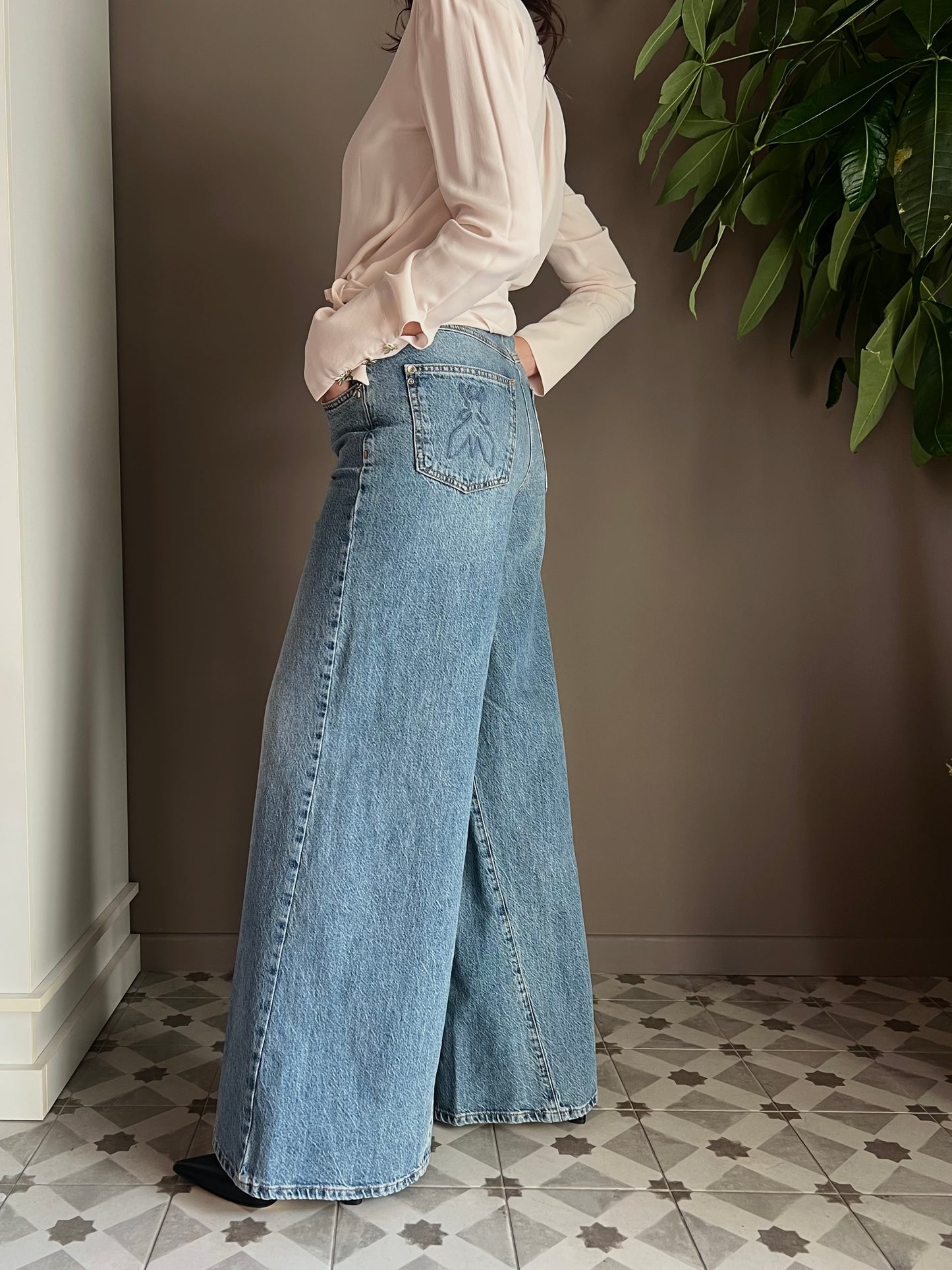 Pantalone denim vita alta gamba larga