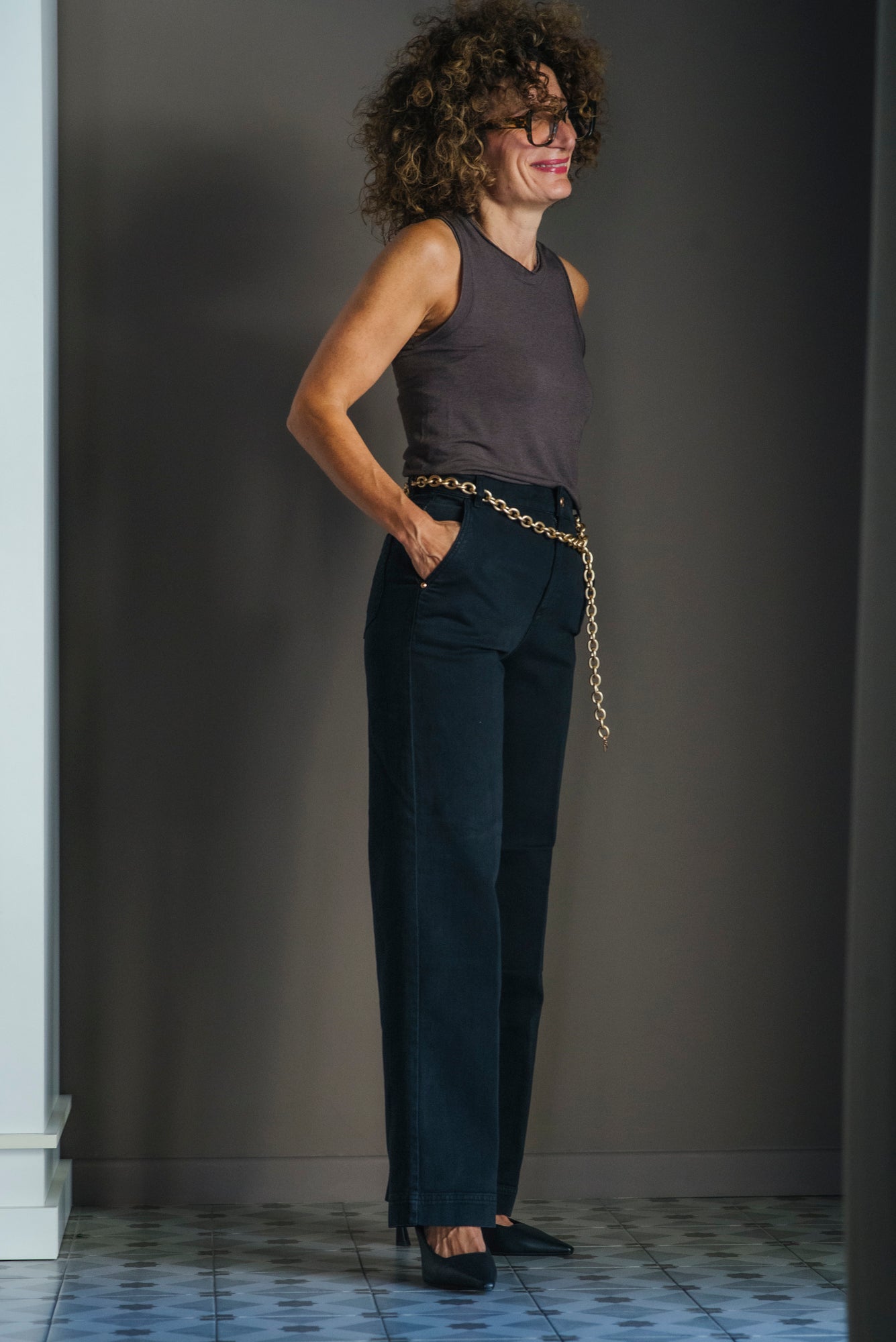 Pantalone denim gamba dritta Nero con catena.