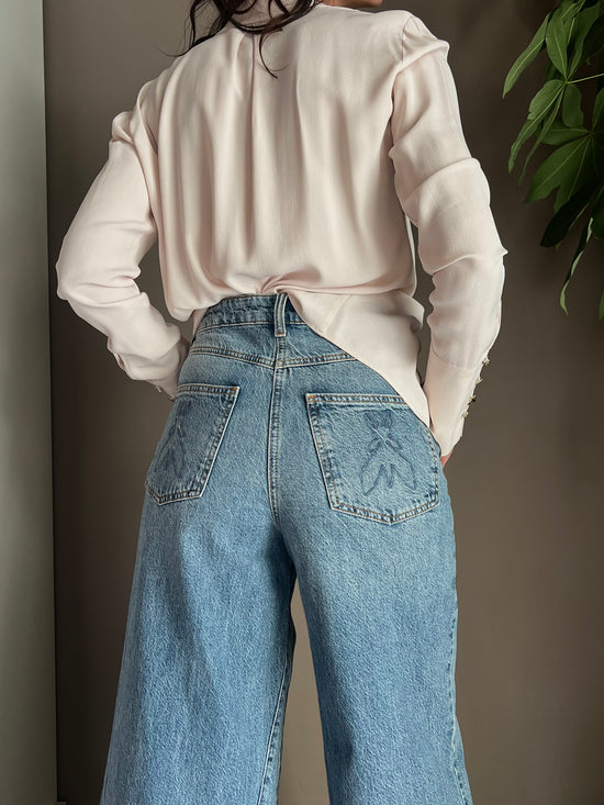 Pantalone denim vita alta gamba larga