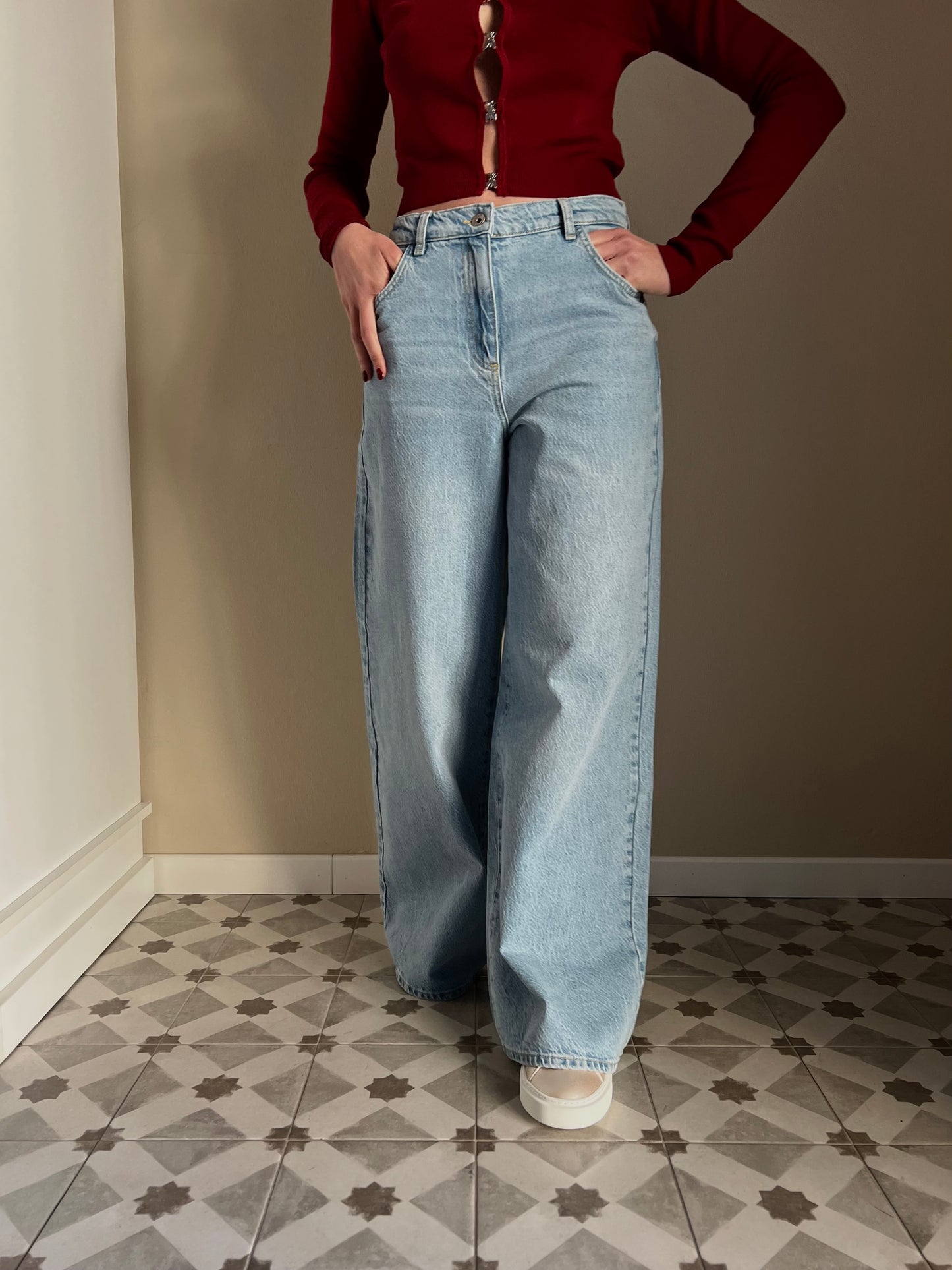 Pantalone jeans vita bassa gamba larga