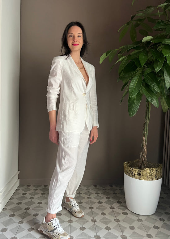 Pantalone in lino bianco con tasche profonde