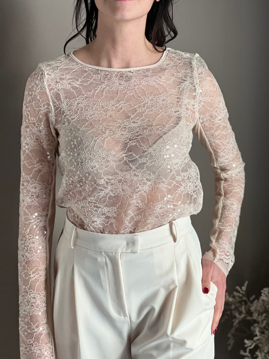 Top a maniche lunghe in pizzo con paillettes