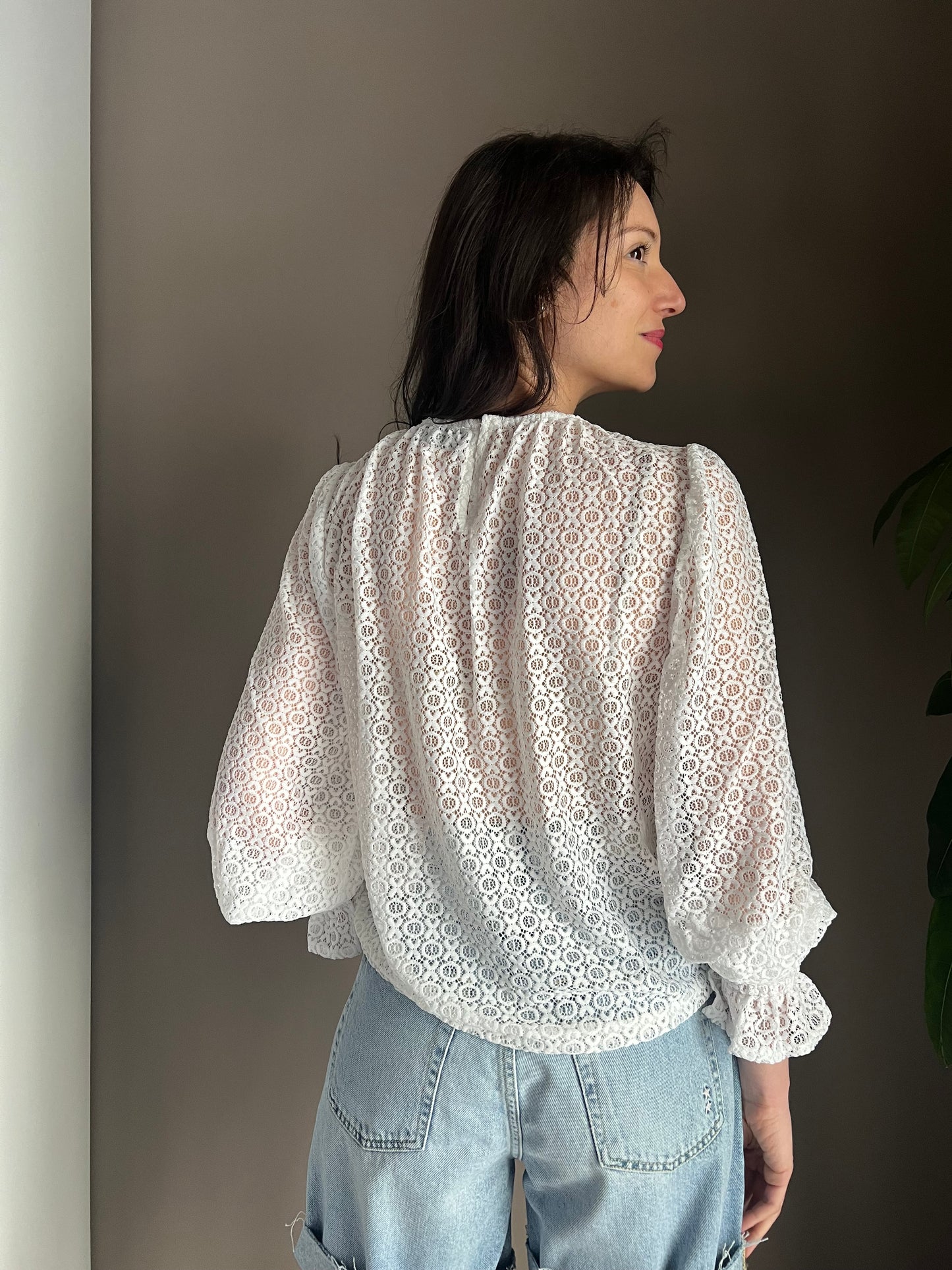 Blusa in pizzo girocollo