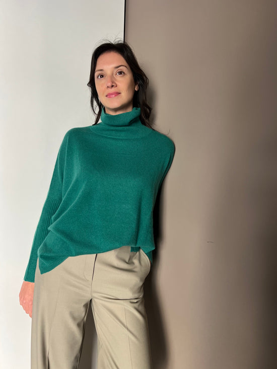 Maglia In Cashemire collo alto maniche aderenti