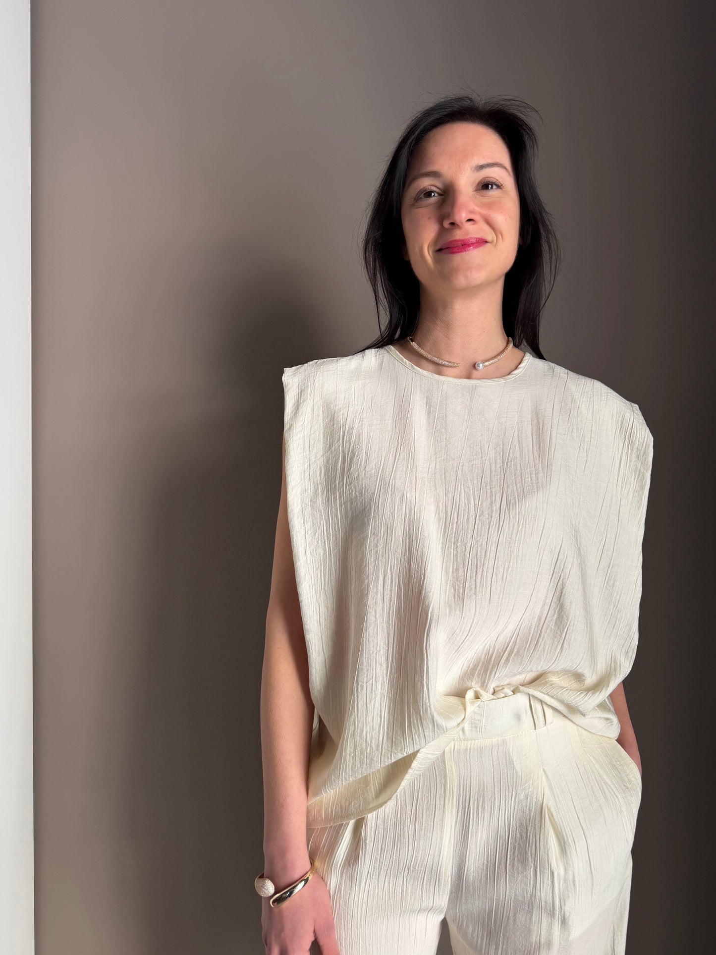 Blusa avorio “fluid sculpt”