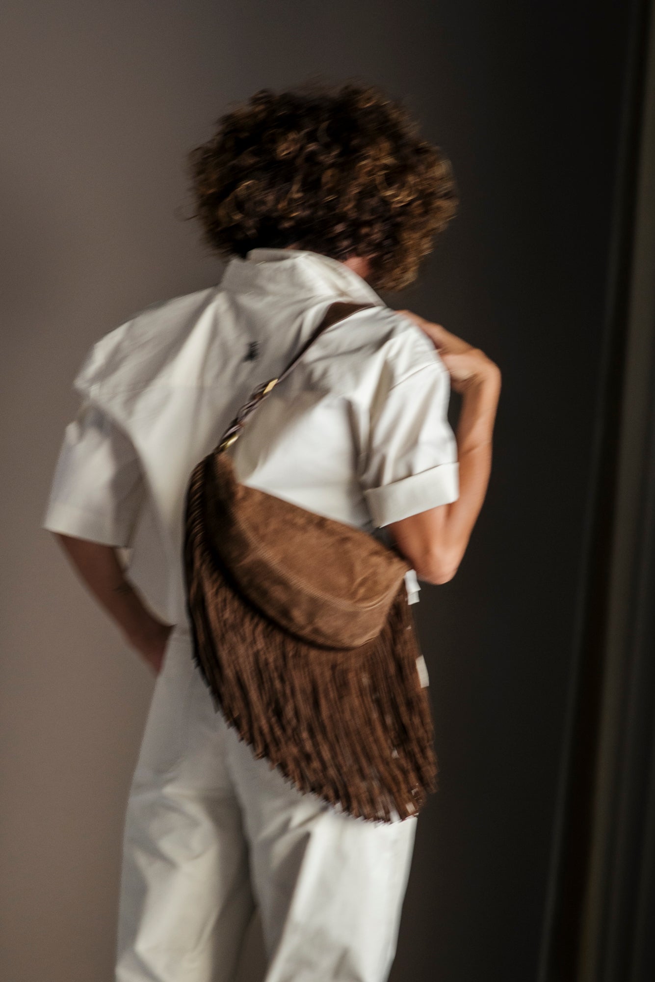 Borsa in suede con frange