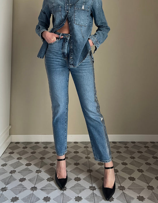 Pantalone denim slim con fascia argento