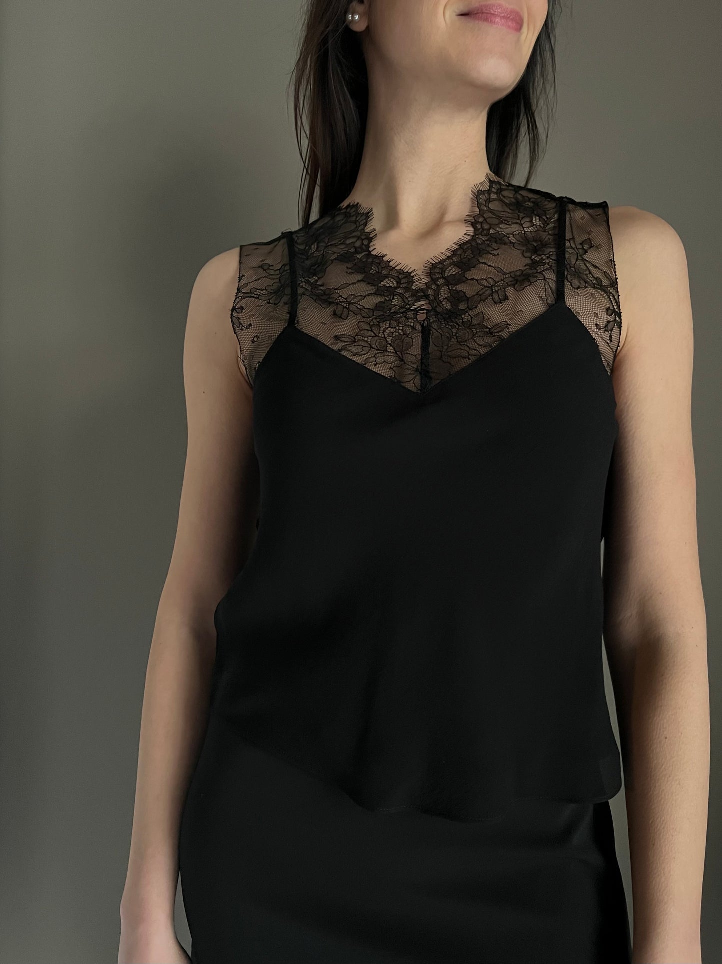 Top con dettagli di pizzo