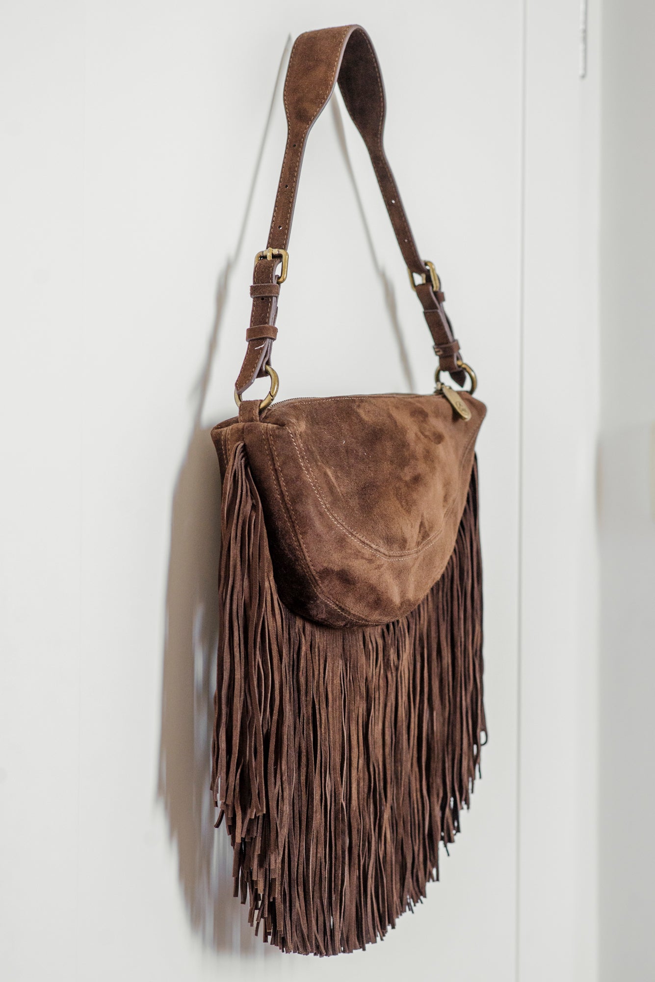 Borsa in suede con frange