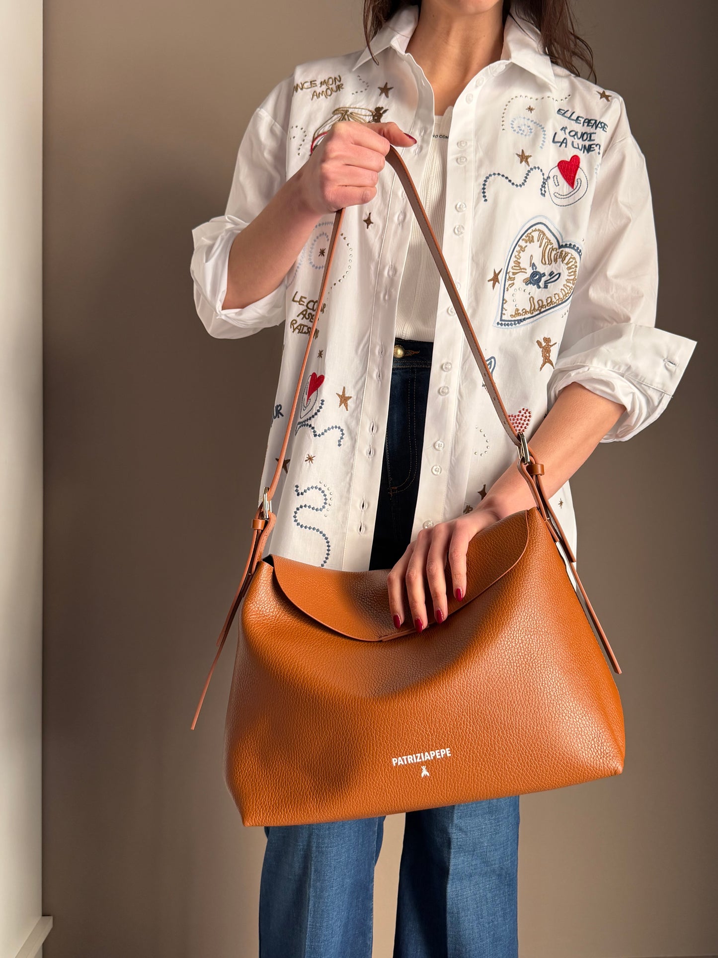 Borsa a tracolla Never grande in pelle