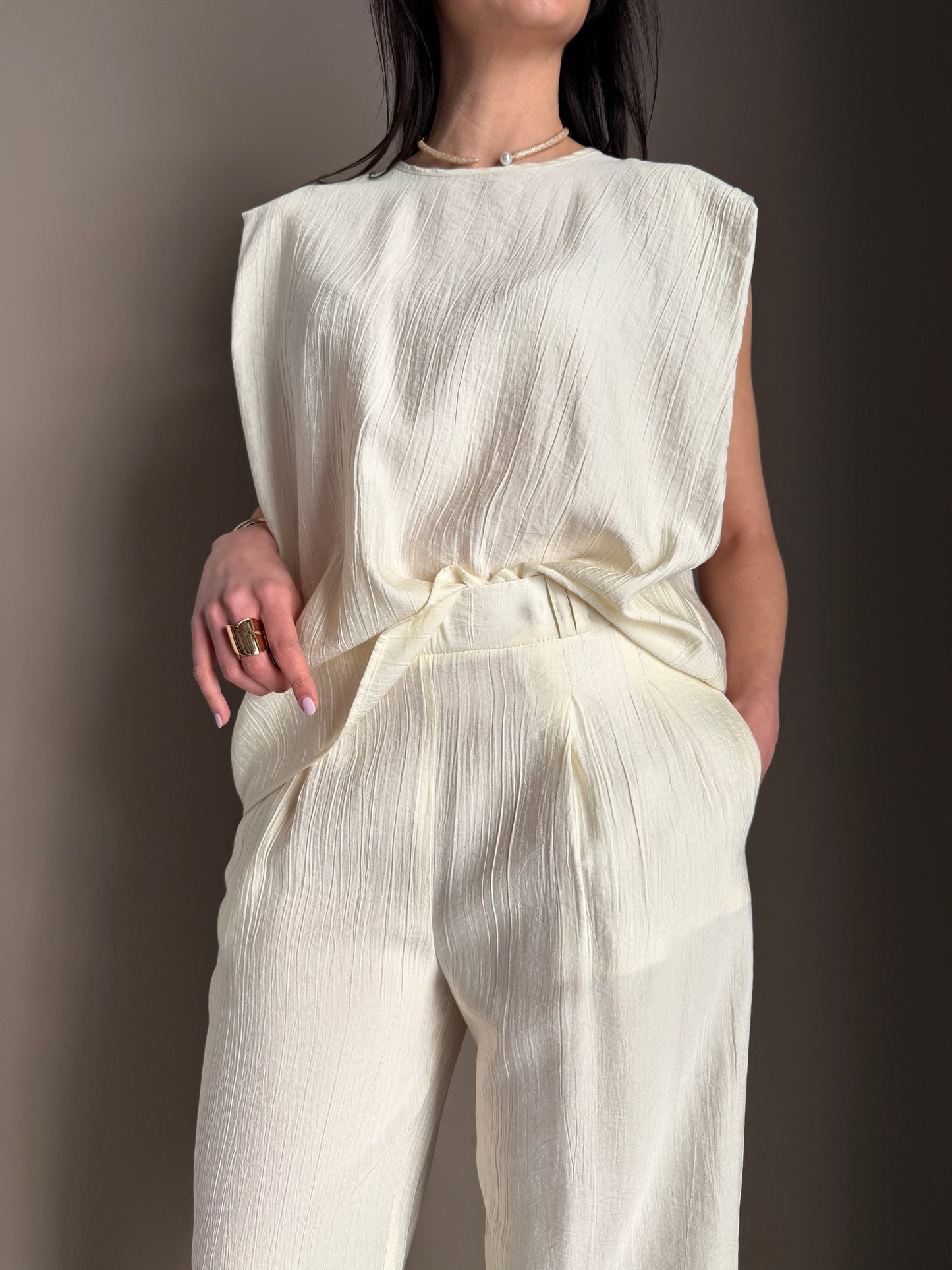 Blusa avorio “fluid sculpt”
