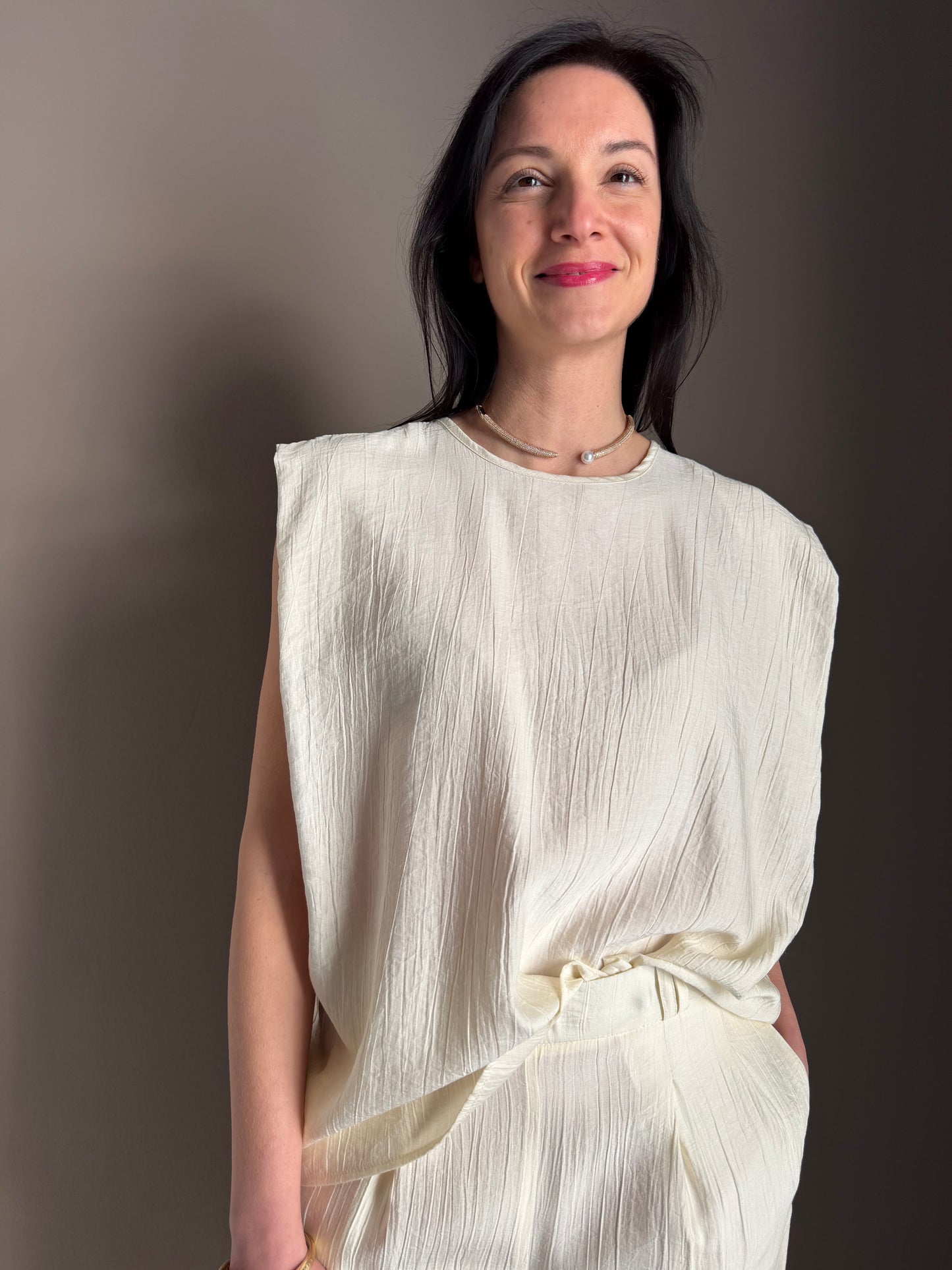 Blusa avorio “fluid sculpt”