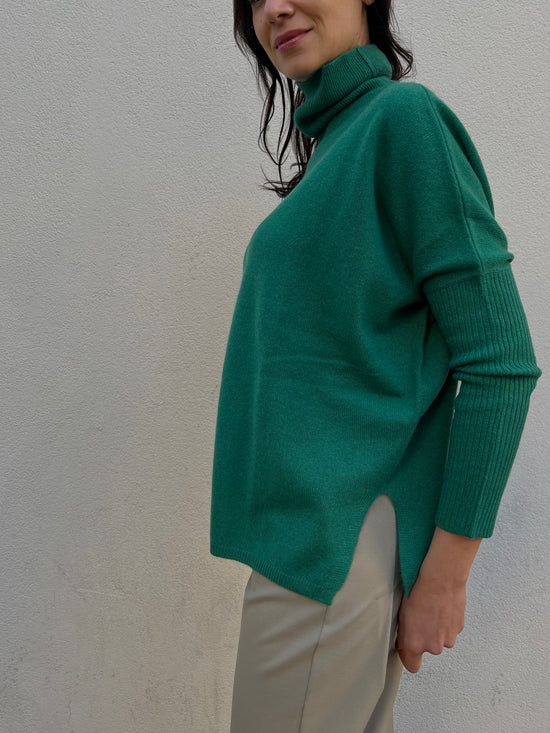 Maglia In Cashemire collo alto maniche aderenti