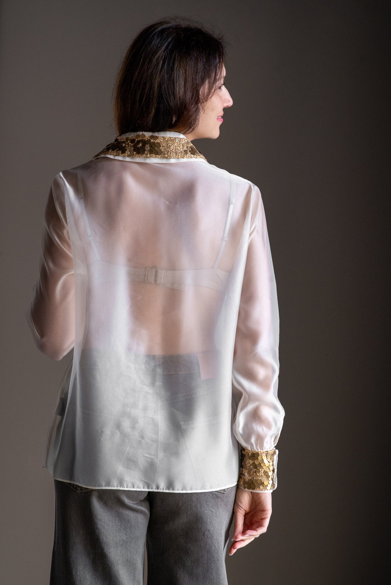 Blusa in organza con dettagli paillettes