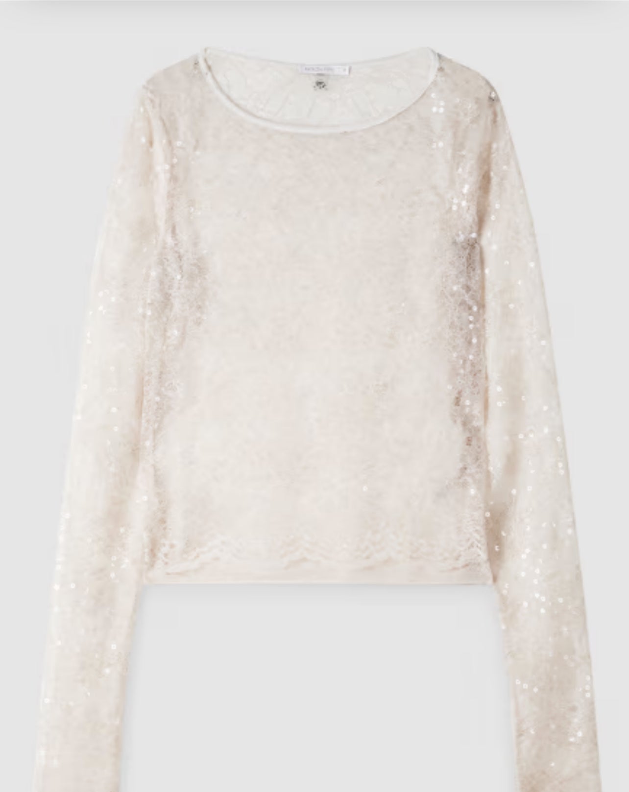 Top a maniche lunghe in pizzo con paillettes