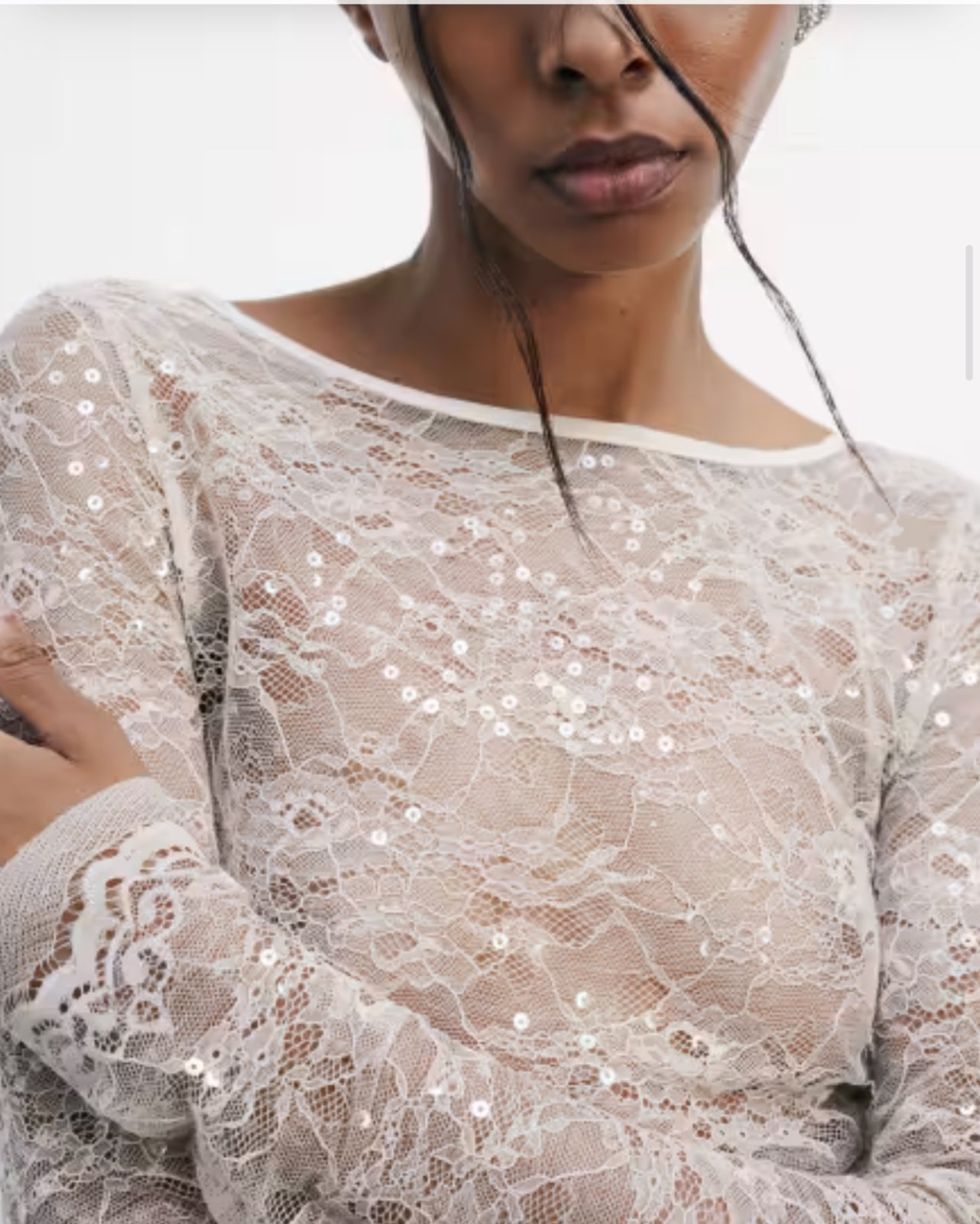 Top a maniche lunghe in pizzo con paillettes